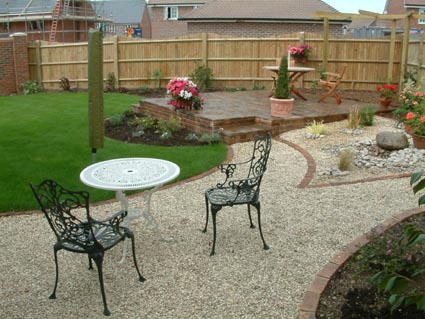 garden design Chippings Y style leading to patio