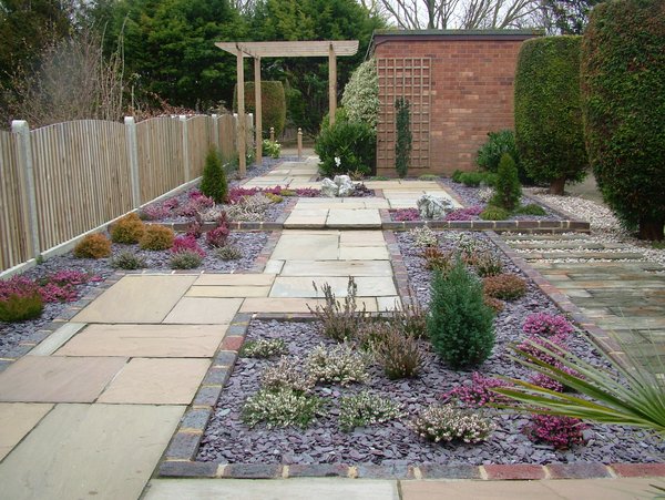 garden design Low maintenance heather beds and sandstone path bringing you to your front door