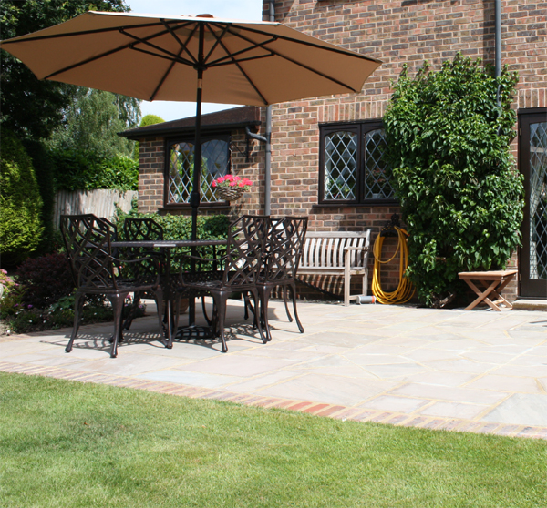 sun_shade_indian_sandstone_patio_brick_edging_nutbourne.jpg